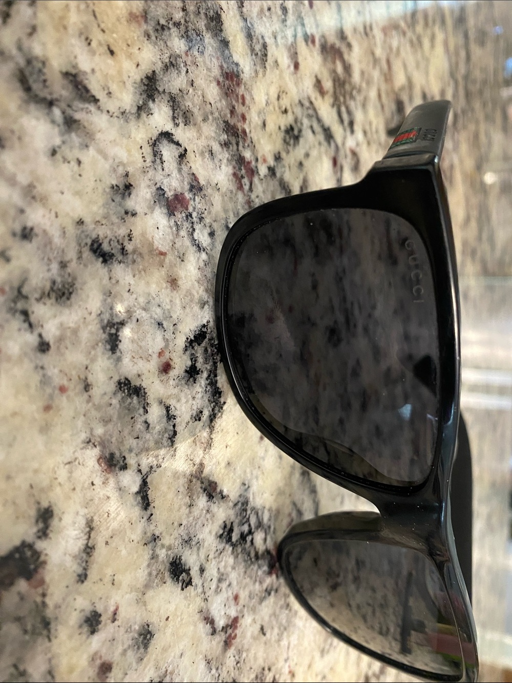 Gucci GG0010S Black Glossy Oversized Sunglasses with Dark Lenses